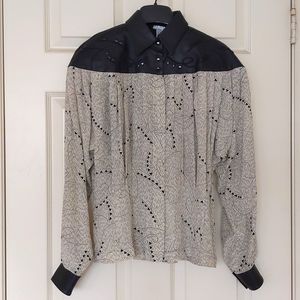 Woman's 100% Silk shirt with suede-leather and embroidery design.